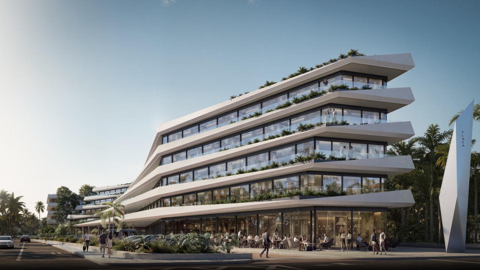 Fachada de Loop Business Center; un círculo de luz revela la vista nocturna del edificio